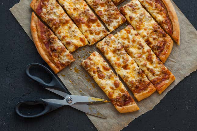 Quad Cities-Style Pizza with cutting scissors