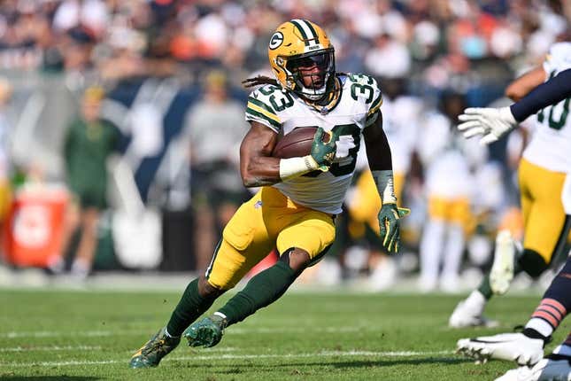Sep 10, 2023; Chicago, Illinois, USA;  Green Bay Packers running back Aaron Jones (33) runs with the ball against the Chicago Bears at Soldier Field.