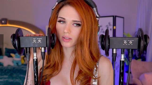 Amouranth performs ASMR into plastic ears on her Twitch channel.