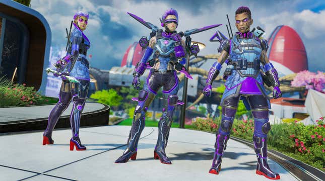Loba, Valkyrie, and Bangalore stand decked out in blue and purple armor and gear in Apex Legends.
