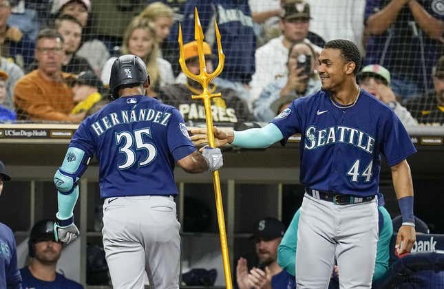 June 6, 2023;  San Diego, California, USA;  Seattle Mariners right fielder Teoscar Hernandez (35) is congratulated by center fielder Julio Rodriguez (44) after hitting a solo home run against the San Diego Padres during the sixth inning at Petco Park.