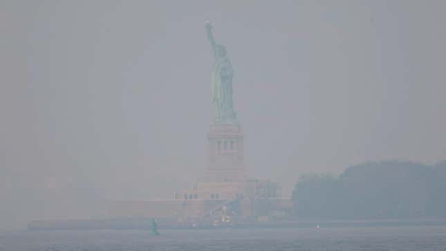 Photo of Statue of Liberty in smoky haze