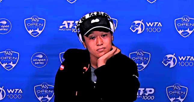 Naomi Osaka listens to a question at Cincy tennis tournament press conference.