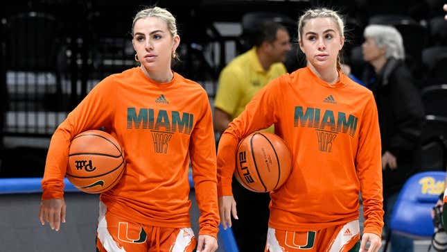  Haley Cavinder (L) and Hanna Cavinder (R) of the Miami Hurricanes warm up before the game against the Pittsburgh Panthers at Petersen Events Center on Jan. 1, 2023.