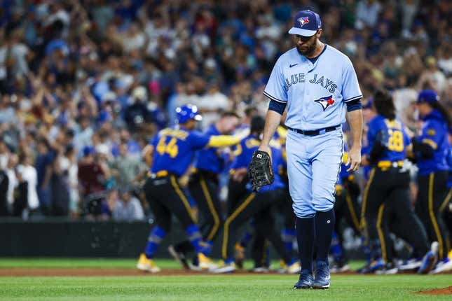 Jul 21, 2023; Seattle, Washington, USA; Toronto Blue Jays first baseman Brandon Belt (13) walks back to the dugout following a 3-2 loss to the Seattle Mariners during the ninth inning at T-Mobile Park.