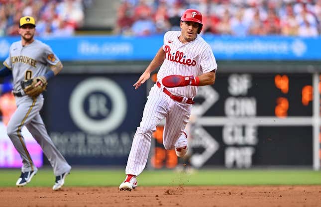 Jul 18, 2023; Philadelphia, Pennsylvania, USA; Philadelphia Phillies catcher J.T. Realmuto (10) advances to third against the Milwaukee Brewers in the second inning at Citizens Bank Park.