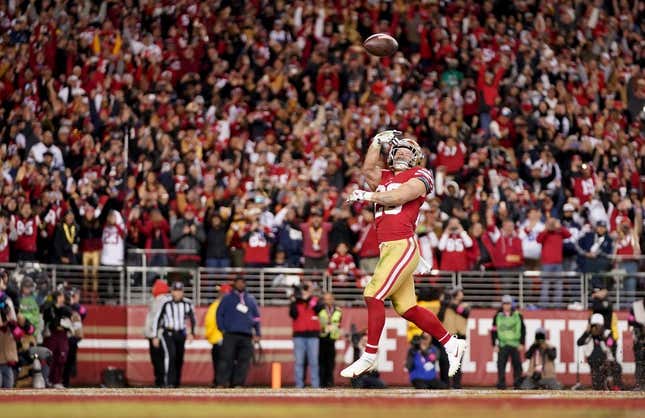 Jan 22, 2023; Santa Clara, California, USA; San Francisco 49ers running back Christian McCaffrey (23) celebrates after scoring a touchdown during the fourth quarter of a NFC divisional round game against the Dallas Cowboys at Levi&#39;s Stadium.