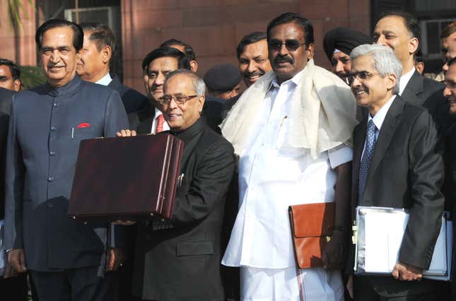 Pranab Mukherjee and his team leaving for parliament to present Budget 2011-12 on Feb. 28, 2011.