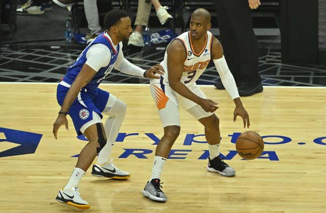 Apr 20, 2023; Los Angeles, California, USA; Los Angeles Clippers guard Norman Powell (24) guards Phoenix Suns guard Chris Paul (3) in the first quarter at Crypto.com Arena.