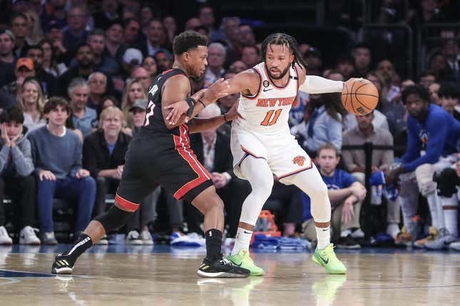 May 10, 2023; New York, New York, USA; New York Knicks guard Jalen Brunson (11) looks to drive past Miami Heat guard Kyle Lowry (7) during game five of the 2023 NBA playoffs at Madison Square Garden.