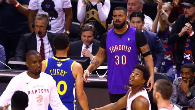 Image for article titled Drake Tries Very Hard To Pretend He Doesn&#39;t Have Steph Curry And Kevin Durant&#39;s Jersey Numbers Tattooed On His Body