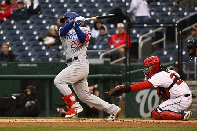 May 3, 2023; Washington, District of Columbia, USA; Chicago Cubs right fielder Seiya Suzuki (27) hits a RBI single against the Washington Nationals during the first inning at Nationals Park.