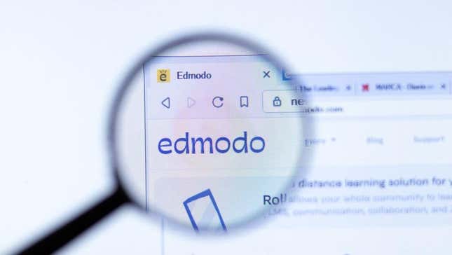 The Edmodo logo under a magnifying glass