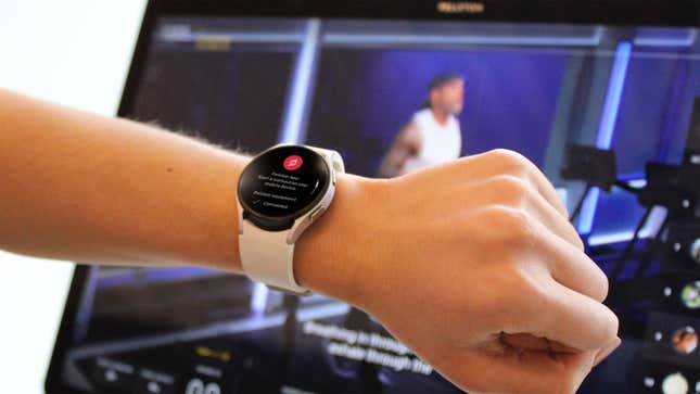 A photo of the Galaxy Watch 5 paired with a Peloton