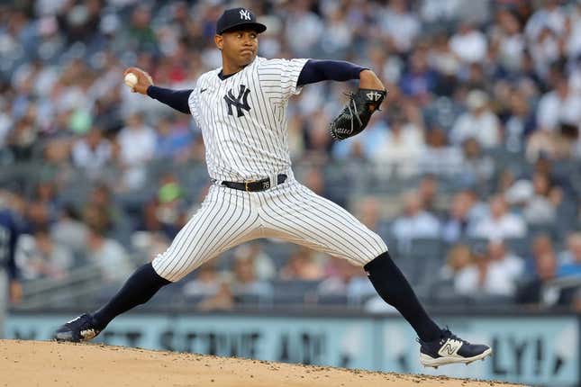 Jun 21, 2023; Bronx, New York, USA; New York Yankees starting pitcher Jhony Brito (76) pitches against Seattle Mariners during the second inning at Yankee Stadium.