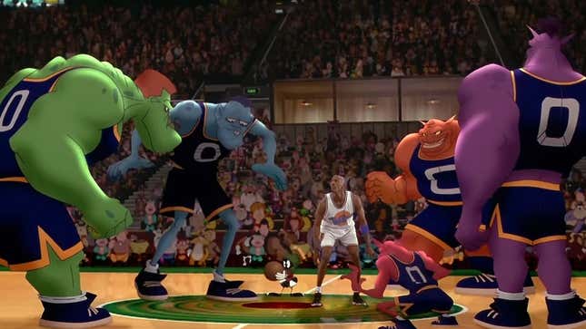 Michael Jordan is surrounded by cartoon aliens and Looney Tunes characters in this still from Space Jam