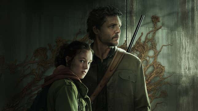Joel and Ellie are seen standing in front of a concrete wall covered in fungus while Ellie looks into the camera.