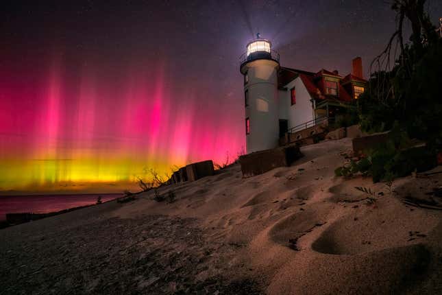 Pink and yellow bands of light in the Michigan sky.