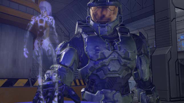 Master Chief stands in his massive armor, talking with a holographic projection of his AI Cortana.