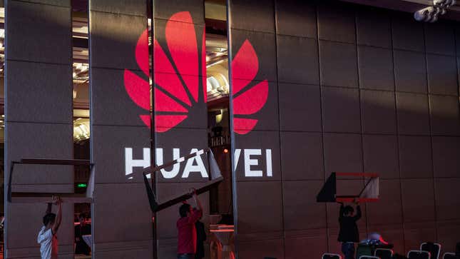 Workers prepare the venue for Huawei HAS2019 Global Analyst Summit on April 16, 2019 in Shenzhen, China.