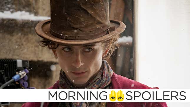 Timothée Chalamet in a top hat and scarf, in costume for his upcoming Warner Bros. Wonka prequel movie.