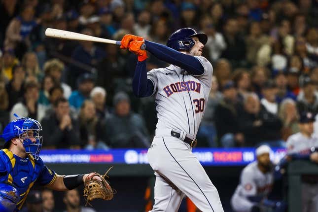 May 5, 2023; Seattle, Washington, USA; Houston Astros right fielder Kyle Tucker (30) hits a two-run home run against the Seattle Mariners during the ninth inning at T-Mobile Park.
