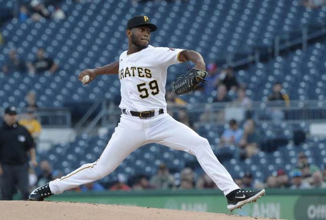 Apr 20, 2023; Pittsburgh, Pennsylvania, USA;  Pittsburgh Pirates starting pitcher Roansy Contreras (59) delivers a pitch against the Cincinnati Reds during the first inning at PNC Park.