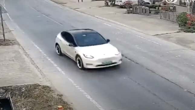 This still image shows the Tesla Model Y involved in a crash on Nov. 5 as it speeds down the street. 