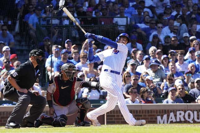 Sep 9, 2023; Chicago, Illinois, USA; Chicago Cubs first baseman Cody Bellinger (24) hits a RBI single against the Arizona Diamondbacks during the third inningat Wrigley Field.