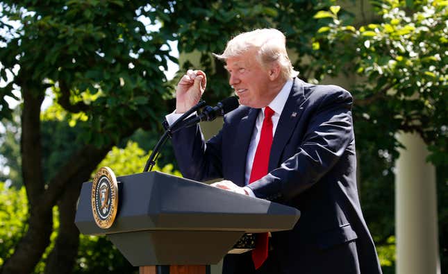 U.S. President Trump refers to temperature change as he announces decision to withdraw from Paris Climate Agreement at White House in Washington