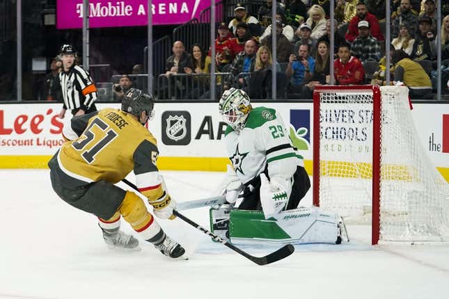 Feb 25, 2023; Las Vegas, Nevada, USA;  Dallas Stars goaltender Jake Oettinger (29) makes a save against Vegas Golden Knights center Byron Forese (51) during the first period at T-Mobile Arena.