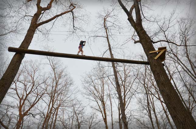 Shea, grade 9, traversing the catwalk.