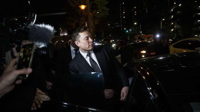 Elon Musk, chief executive officer of Tesla Inc., departs from federal court in Los Angeles, California, U.S., on Tuesday, Dec. 3, 2019. Musk will have to go before a federal jury and defend calling a British caver a “pedo guy.”  