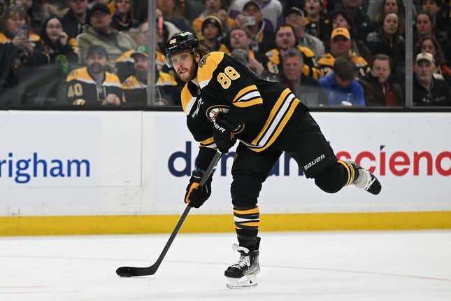 Mar 30, 2023; Boston, Massachusetts, USA; Boston Bruins right wing David Pastrnak (88) takes a shot against the Columbus Blue Jackets  during the first period at the TD Garden.