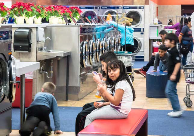 The aisles are crowded with kids and carts during busy times.