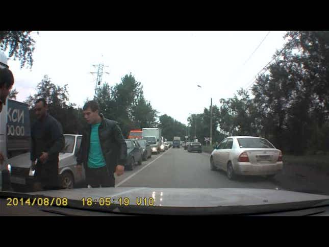 Watch A Gun-Toting Carjacker Get Owned In This Russian Dashcam Video