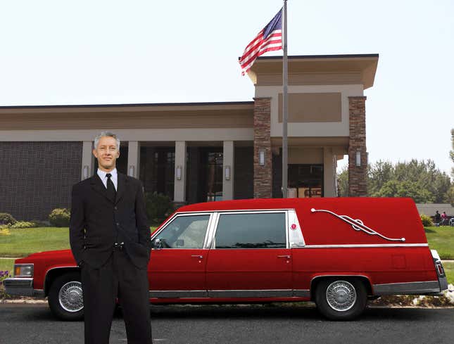 Image for article titled Middle-Aged Funeral Director Buys Flashy Red Hearse