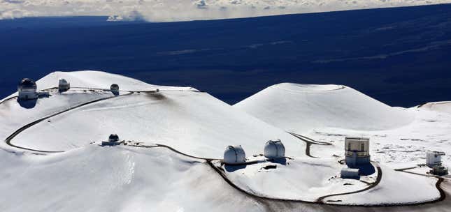 Aerial view of observatories atop Mauna Kea. Image: Tim Wright/AP