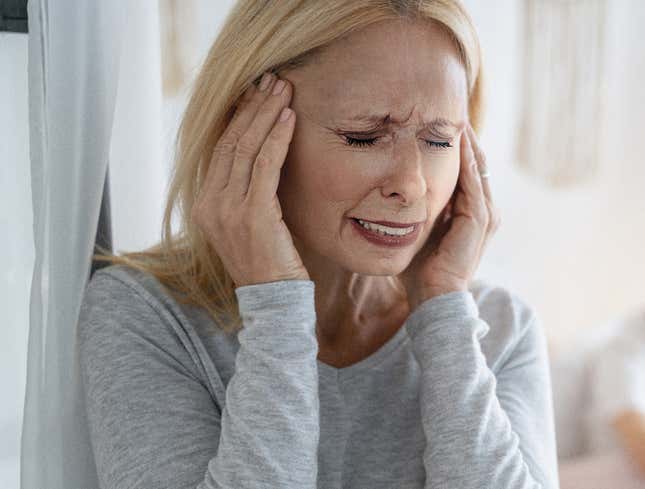 Image for article titled Wincing, Screaming Mom Feels Searing Pain In Head Every Time Daughter Across Country Wears Sock With Hole In It