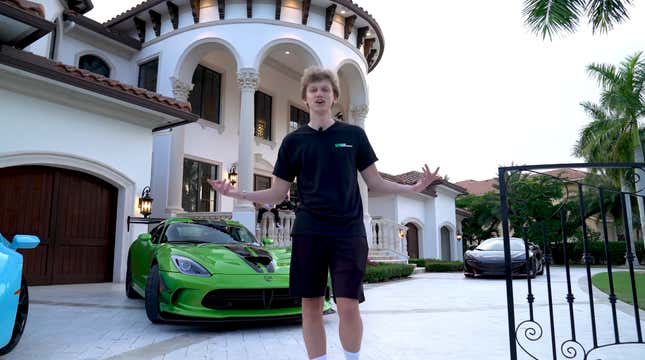 Youtuber Formula standing outside the new mansion he just co-purchased with other Fortnite players. 