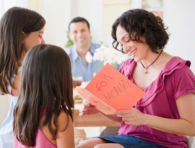 Image for article titled Woman Mentally Rearranging Rankings Of Children While Opening Mother’s Day Gifts