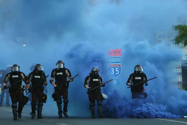 Police advance on demonstrators who are protesting the killing of George Floyd on May 30, 2020 in Minneapolis, Minnesota.