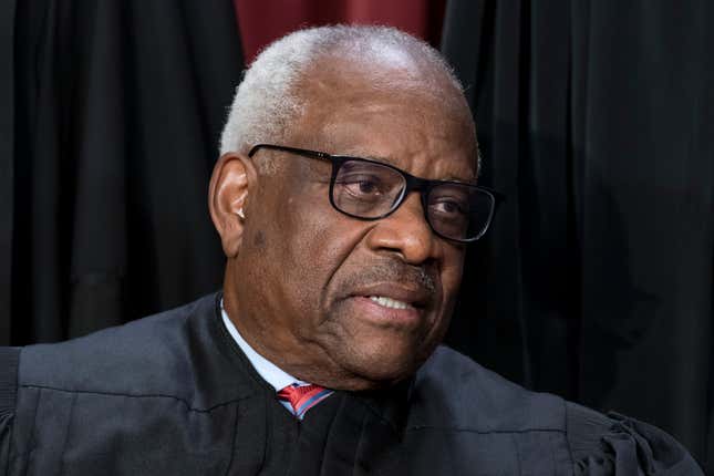 Associate Justice Clarence Thomas joins other members of the Supreme Court as they pose for a new group portrait, at the Supreme Court building in Washington, Friday, Oct. 7, 2022. Justice Thomas was nominated by President George H. W. Bush to succeed Justice Thurgood Marshall and has served since 1991.