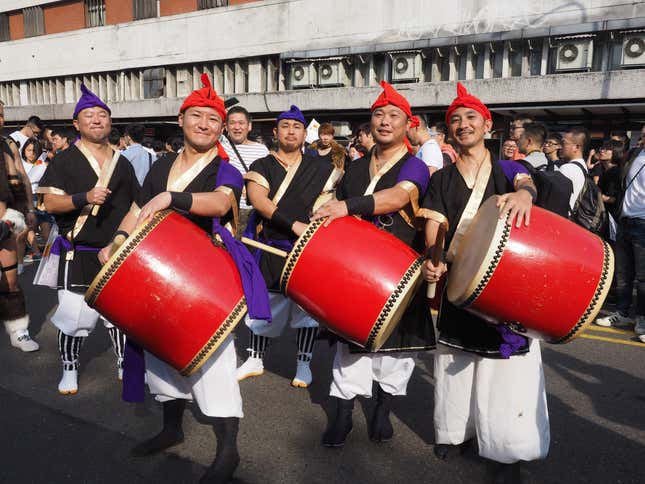 Men from Japan take part in the 2017 Taipei Gay Pride March in Taipei, 28 October 2017.