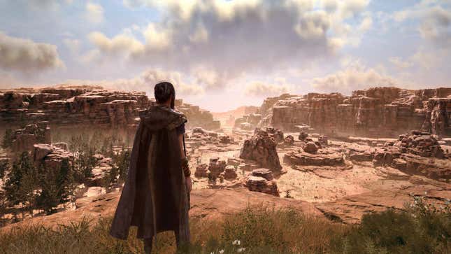 a woman stands in a dusty canyon in forspoken