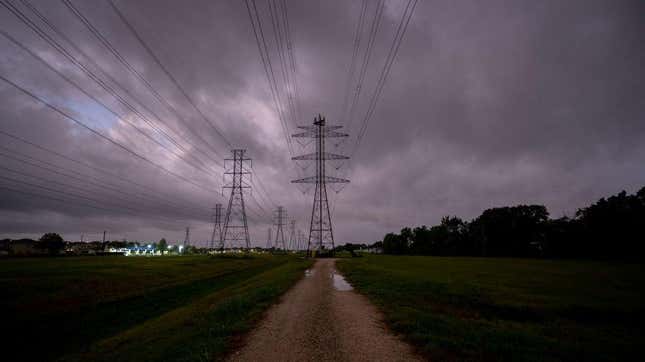 Transmission towers are seen near the CenterPoint Energy power plant on July 11, 2022 in Houston, Texas. 