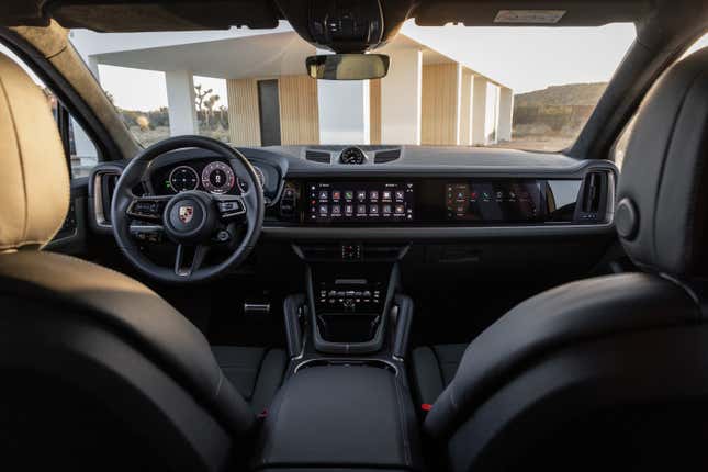 A view of the dashboard of the Porsche Cayenne S 2024. There are multiple screens.