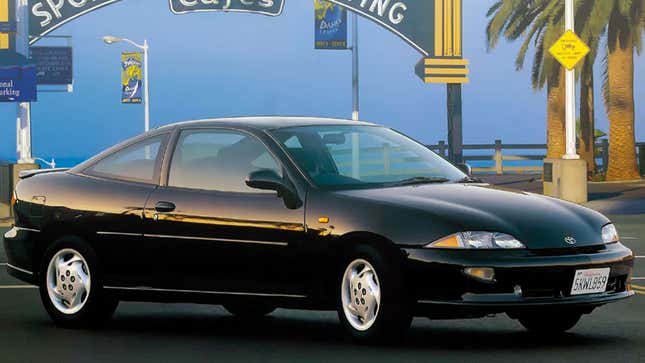 A photo of a black Toyota Cavalier coupe. 