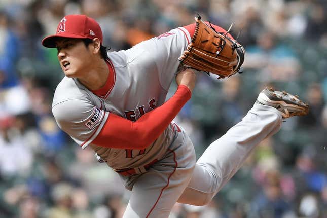 Apr 5, 2023; Seattle, Washington, USA; Los Angeles Angels starting pitcher Shohei Ohtani (17) throws a pitch against the Seattle Mariners during the fifth inning at T-Mobile Park.
