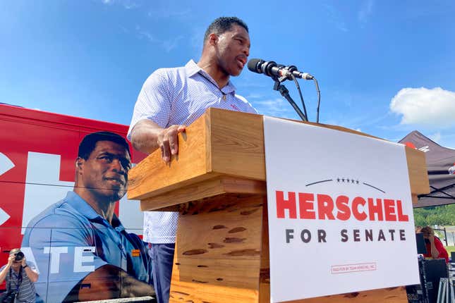 Republican Senate candidate Herschel Walker campaigns Sept. 7, 2021, in Emerson, Ga. Georgia voters will see at least one fall debate between Sen. Raphael Warnock and Republican challenger Herschel Walker. Warnock on Tuesday evening accepted Walker’s proposal for an Oct. 14 debate in Savannah.